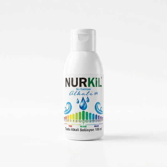 Nurkil Alkali Mineral Su Damlası 100 ml beyaz fon ürün fotoğrafı ve pH cetveli detaylı etiket.